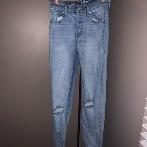 Celebrity pink ripped knee mom jeans